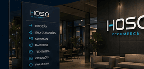 Recepção da HOSQ Ecommerce com sinalização interna dos setores e marca na parede